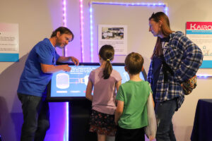 Kairos Power employees engage with kids and families during Nuclear Energy Discovery Day at the American Museum of Science and Energy