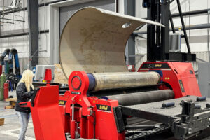 A plate roller produces a reactor vessel at the Kairos Power Manufacturing Development Campus